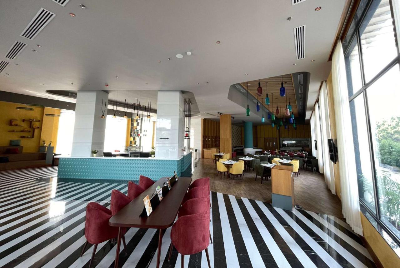 Ramada Encore By Wyndham Amritsar Airport Exterior photo